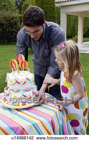Man holding party cake View Large Photo Image Stock Image - Man holding party cake. Fotosearch