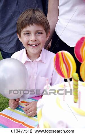 Portrait of boy at outdoor party View Large Photo Image Stock Image - Portrait of boy at outdoor party. Fotosearch