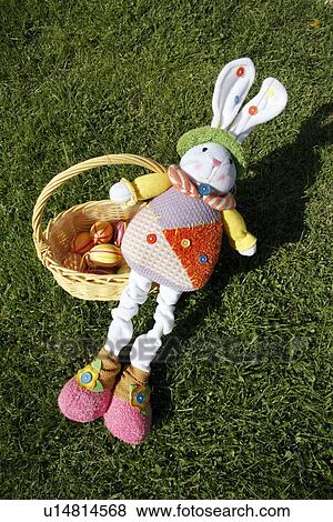 Doll and Easter egg basket View Large Photo Image Stock Photo - Doll and Easter egg basket. Fotosearch