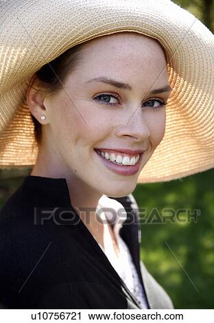 Stock Image - Portrait of young woman. Fotosearch