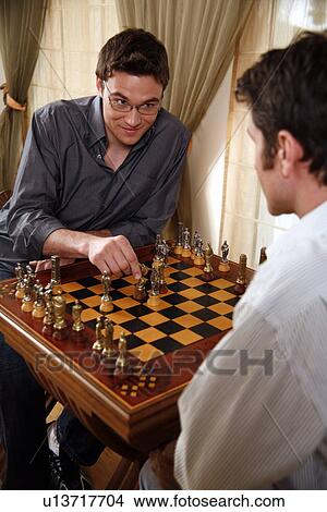 Two men playing chess View Large Photo Image Picture - Two men playing chess. Fotosearch