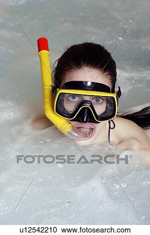 One woman wearing mask and snorkel in jacuzzi at a spa View Large Photo Image Stock Image - One woman wearing mask and snorkel in jacuzzi at a spa. Fotosearch