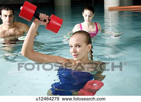 People exercising in a spa pool View Large Photo Image Stock Photo - People exercising in a spa pool. Fotosearch