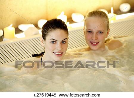 Two women in jacuzzi at a spa View Large Photo Image Stock Photography - Two women in jacuzzi at a spa. Fotosearch