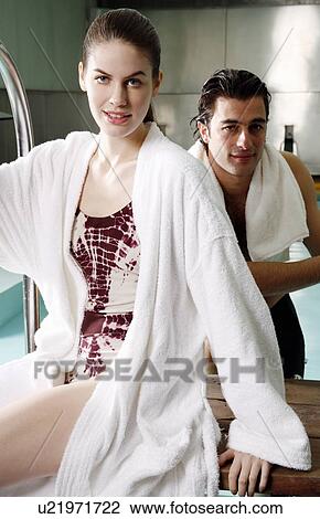Stock Image - Young couple in a swimming pool at a spa. Fotosearch