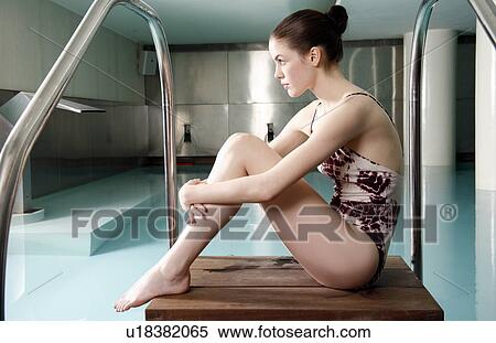 Young woman sitting next to spa pool View Large Photo Image Stock Photography - Young woman sitting next to spa pool. Fotosearch