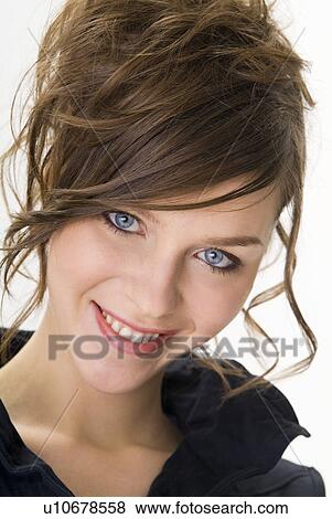 Stock Photo - Portrait of young woman. Fotosearch