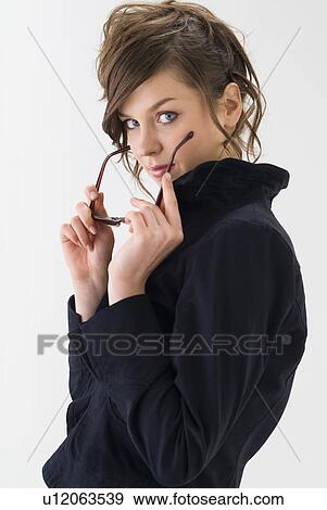 Portrait of young woman View Large Photo Image Stock Photo - Portrait of young woman. Fotosearch