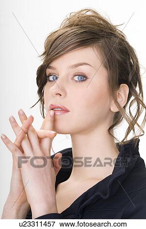 Portrait of young woman View Large Photo Image Stock Photo - Portrait of young woman. Fotosearch