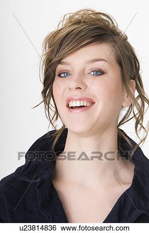 Stock Photograph - Portrait of young woman. Fotosearch