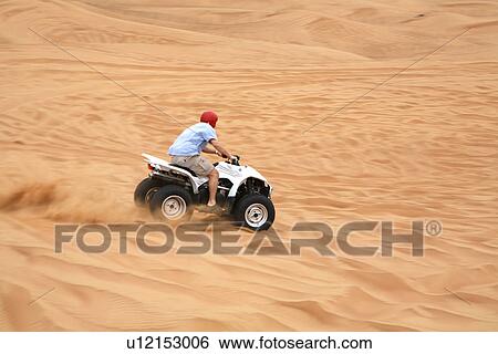 Stock Photograph - quad, desert, sand, sport. Fotosearch