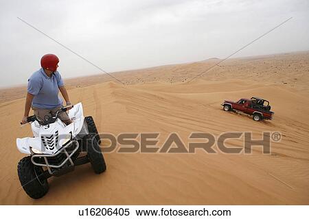 Stock Photography - quad, desert, sand, sport. Fotosearch