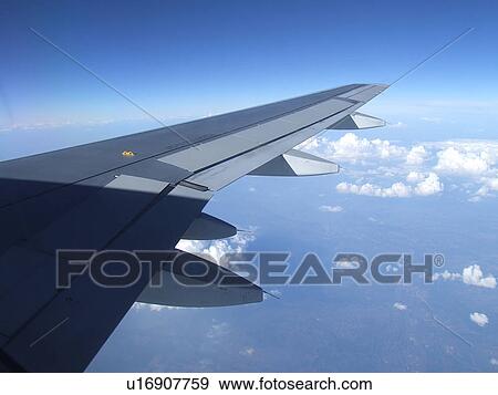 Stock Photo - Sky, Aeroplane, Flying, Fly, Flight, Clouds, Airplane. Fotosearch