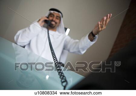 Picture - business, businessmen, businessman, Arabic. Fotosearch
