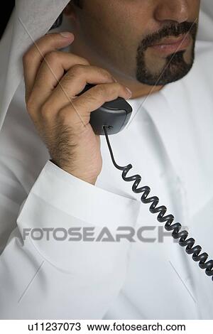 Stock Image - business, businessmen, businessman, Arabic. Fotosearch