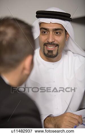 Stock Photo - business, businessmen, businessman, Arabic. Fotosearch