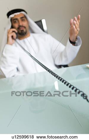 Stock Photo - business, businessmen, businessman, Arabic. Fotosearch