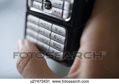 Stock Image - buttons, business, phone, mobile, keyboard, Arabic. Fotosearch