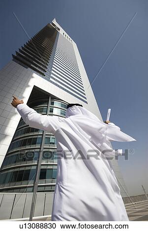 dishdash, businessman, shumagh, tower, business, trade, arabic View Large Photo Image Stock Image - dishdash, businessman, shumagh, tower, business, trade, arabic. Fotosearch