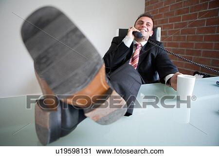 foot, business, phone, businessmen, businessman, Arabic View Large Photo Image Stock Image - foot, business, phone, businessmen, businessman, Arabic. Fotosearch