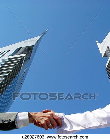 Stock Image - hands, business, shaking, shake, men, arabic. Fotosearch
