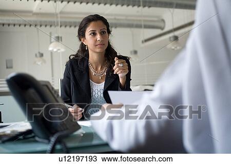 Stock Image - meeting, business, contract, businessmen, businessman, Arabic. Fotosearch