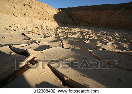 Stock Image - dried, dryed, desert, view, sand, after. Fotosearch