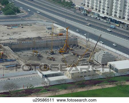 Stock Image - construction, site, dubai, crane, bulldozer. Fotosearch