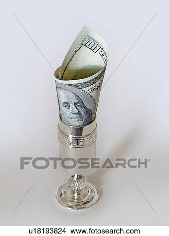Picture - business, holding, banking, cash, economy, oil, savings. Fotosearch