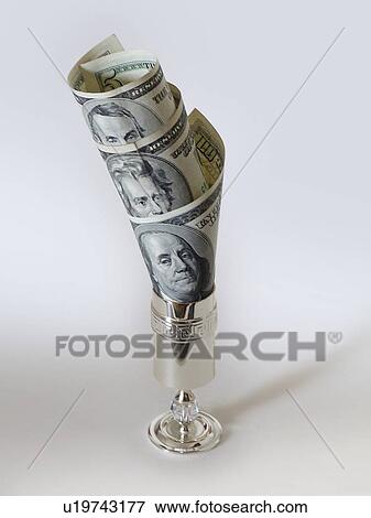 Stock Photo - business, holding, banking, cash, economy, oil, savings. Fotosearch