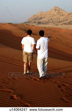 Stock Photo - dubai, desert, safari, dune, sand, drive, walking. Fotosearch