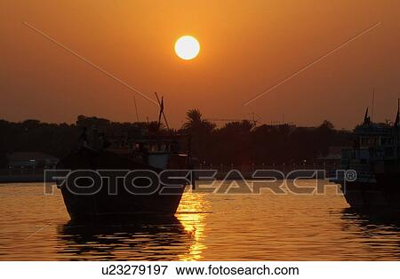 dhow, dohw, dubai, creek, sunset, sunrise, goldish View Large Photo Image Stock Photo - dhow, dohw, dubai, creek, sunset, sunrise, goldish. Fotosearch