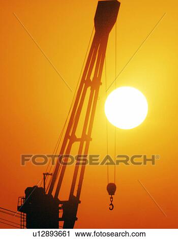 Stock Image - dubai, construction, sunset, sunrise, crane, working. Fotosearch