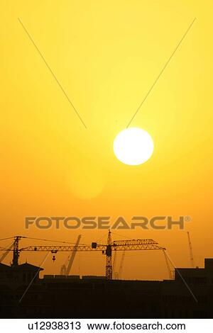 Stock Image - dubai, sky, sunset, sunrise. Fotosearch