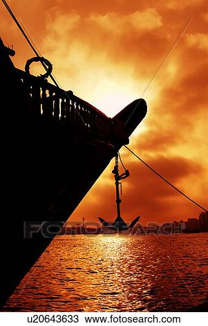 Stock Image - silhouette, dubai, creek, sunrise, sunset, yellow, orange. Fotosearch