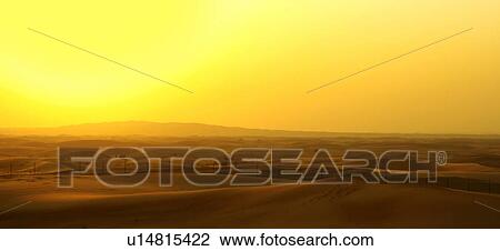 sunset, sunrise, desert, yellow, gold View Large Photo Image Stock Image - sunset, sunrise, desert, yellow, gold. Fotosearch