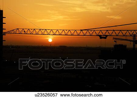 Stock Photo - sunset, sunrise, rise, construction, dubai, building. Fotosearch