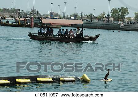 dubai, dhow, creek, deira, boat, taxi, transport View Large Photo Image Stock Photo - dubai, dhow, creek, deira, boat, taxi, transport. Fotosearch
