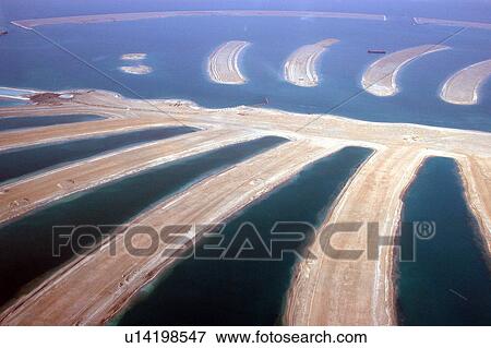 Stock Photo - dubai, aerial, dubai, palm, jebel, construction. Fotosearch