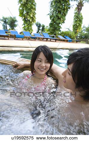 Couple in a Jacuzzi, Saipan View Large Photo Image Stock Photography - Couple in a Jacuzzi, Saipan. Fotosearch