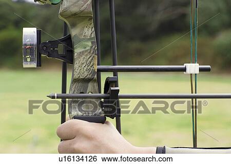 Stock Photograph - Close-up of bow and arrow. Fotosearch