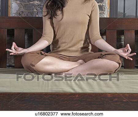 Mid-Adult Woman Meditating View Large Photo Image Stock Photo - Mid-Adult Woman Meditating. Fotosearch