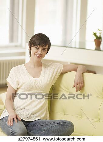 Portrait of Young Woman on Sofa View Large Photo Image Stock Image - Portrait of Young Woman on Sofa. Fotosearch