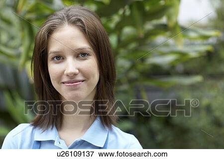 Stock Photo - Portrait of female florist. Fotosearch