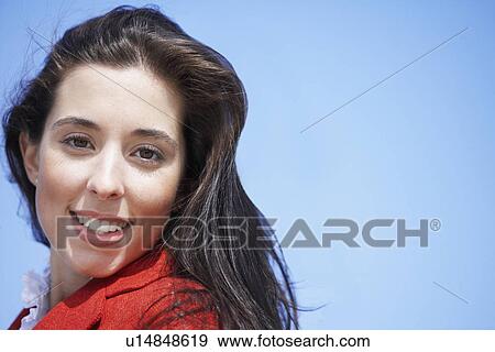 Young woman smiling (portrait) View Large Photo Image Stock Photo - Young woman smiling (portrait). Fotosearch