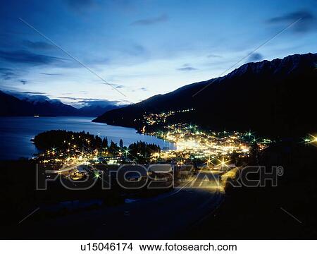 Town By Lake At Night View Large Photo Image Picture - Town By Lake At Night. Fotosearch