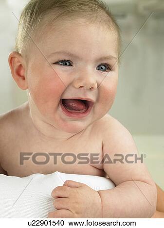Baby and laughing View Large Photo Image Stock Image - Baby and laughing. Fotosearch