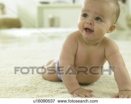 Baby crawling and smiling View Large Photo Image Stock Photo - Baby crawling and smiling. Fotosearch