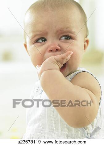 Stock Photo - Baby crying. Fotosearch