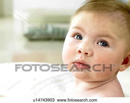 Baby looking upward View Large Photo Image Stock Image - Baby looking upward. Fotosearch